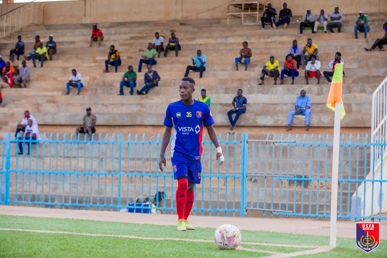 Sanou during a match, home kit